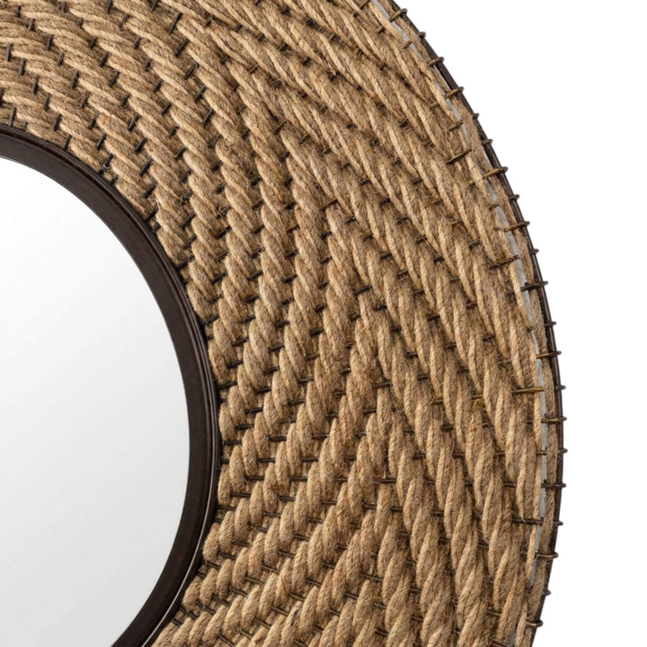 Close-up detail of the jute weave highlighting the natural fiber texture around the mirror frame.