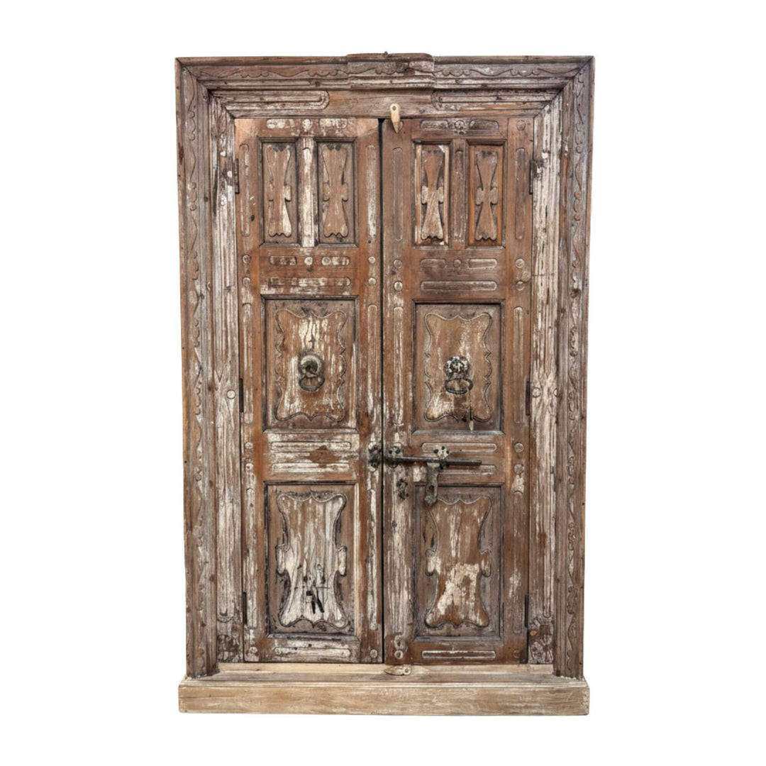 Front view of the Pradesh wardrobe crafted from distressed sheesham wood.
