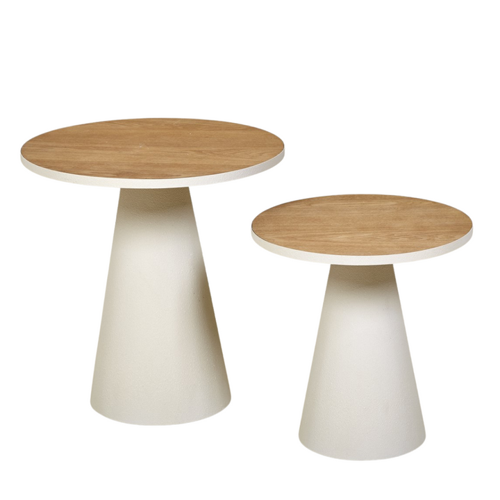 Group view of Prana Side Tables in two sizes showing their sculptural metal bases and wooden tops.