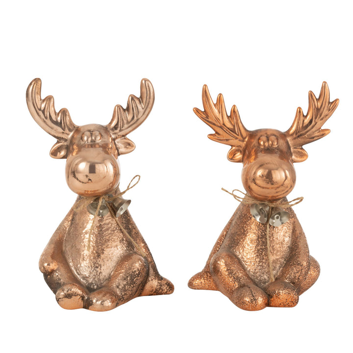 Pair of copper Prancer & Vixen reindeer figures in a seated holiday pose.