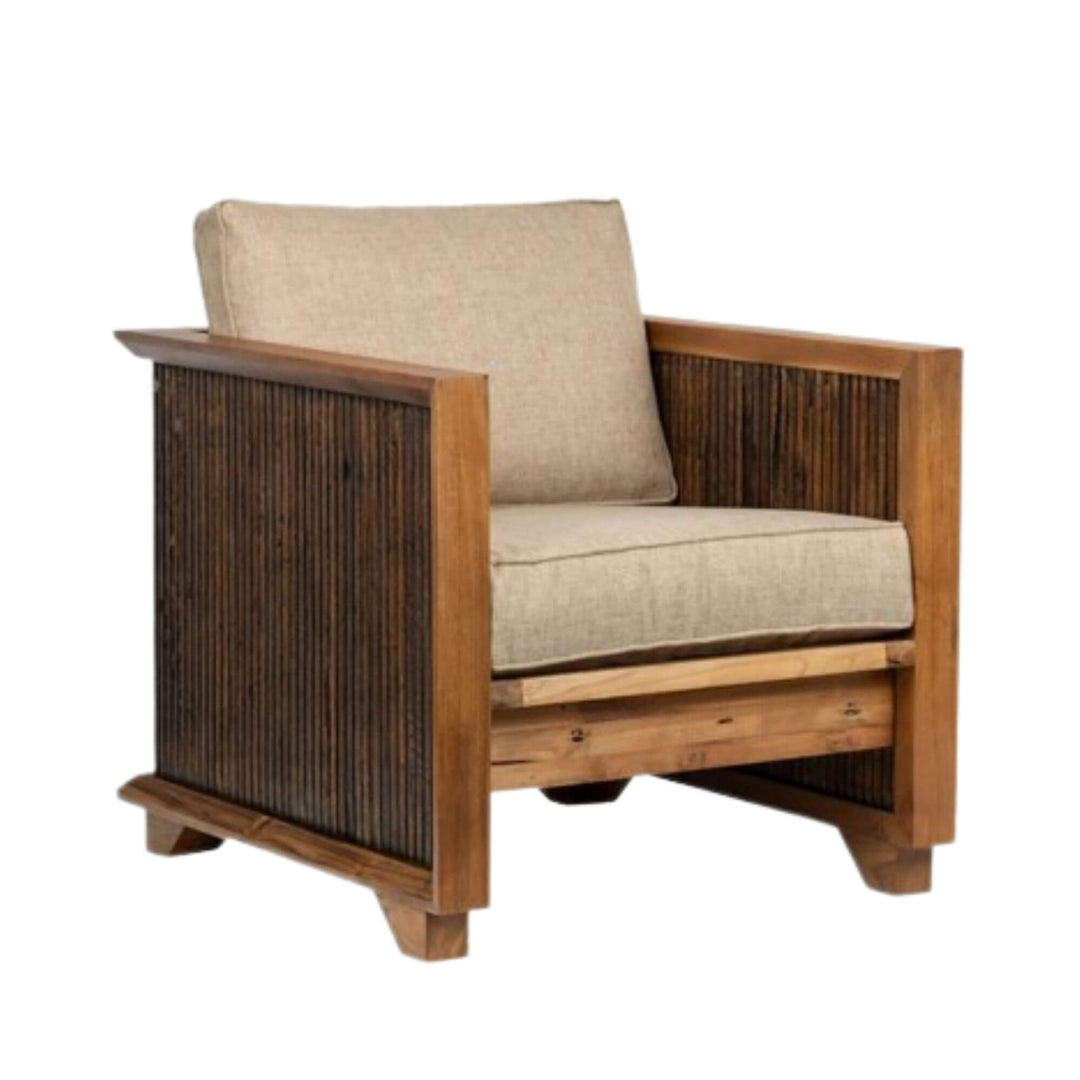 Front view of the Punka armchair showcasing its solid wood frame and upholstered seat.