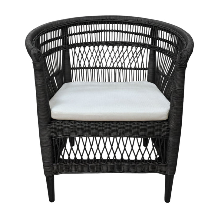 Front view of the Punta Blanca Chair made of black rattan and teak wood.