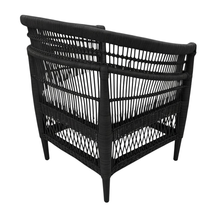 Rear view of the handcrafted black rattan and teak Punta Blanca Chair.