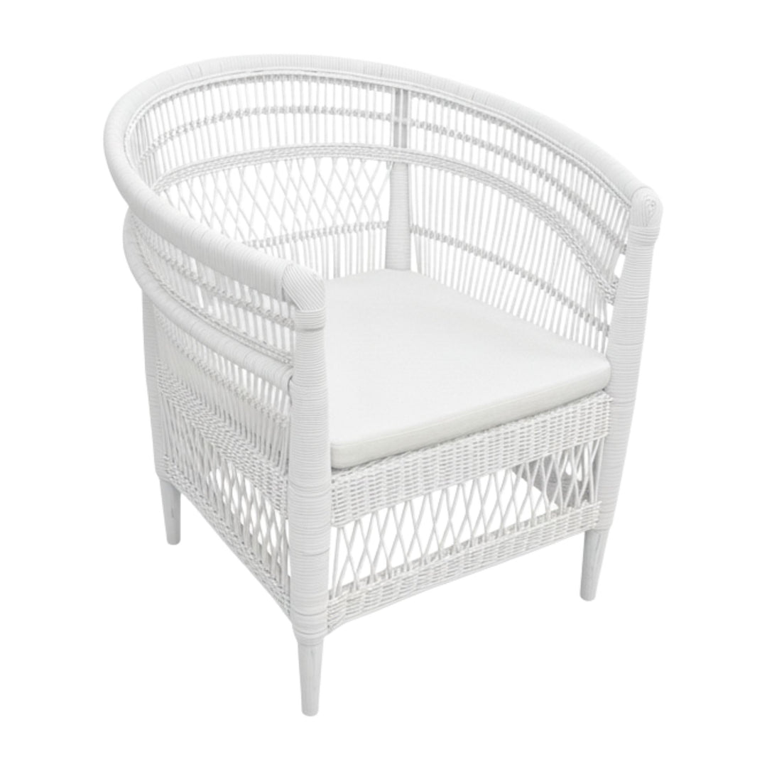 Angled view of the Punta Blanca Chair made of white rattan and teak wood.