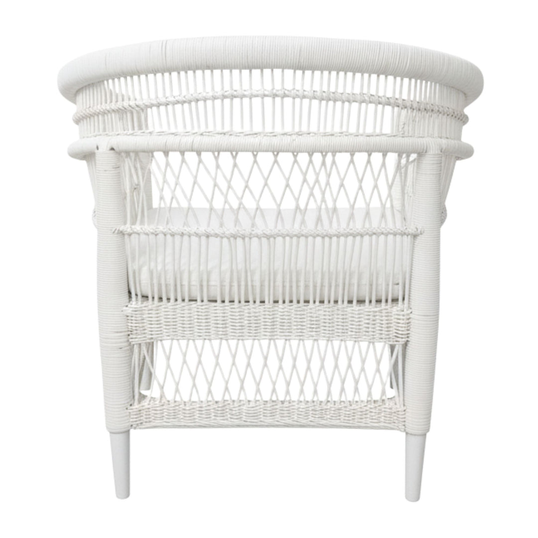 Rear view of the handcrafted white rattan and teak Punta Blanca Chair.