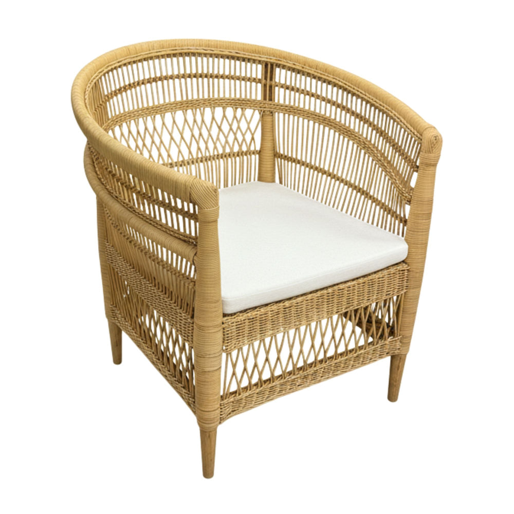 Angled view of the natural rattan weave and teak frame of the Punta Blanca Chair.