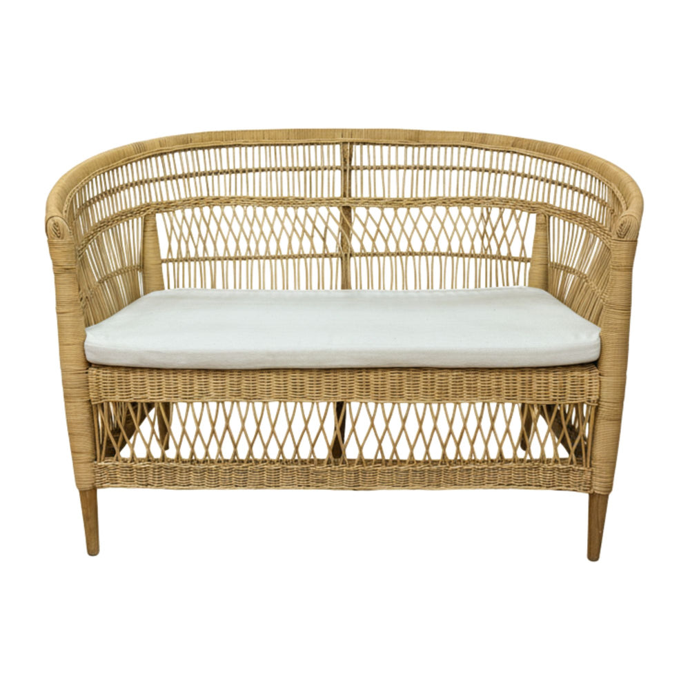 Front view of the Punta Blanca Sofa made of natural rattan with teak frame.