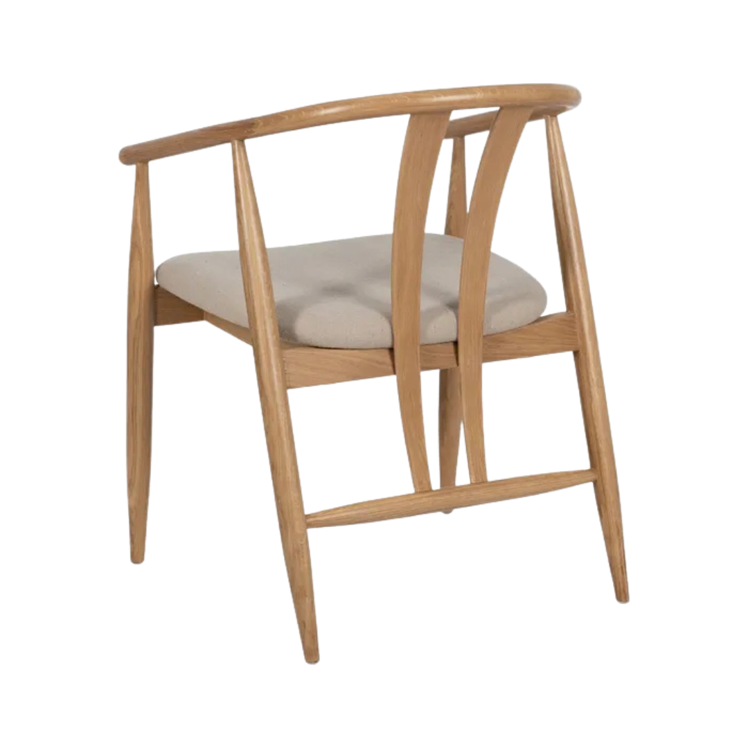 Angled view highlighting natural oak grain and contemporary dining chair design