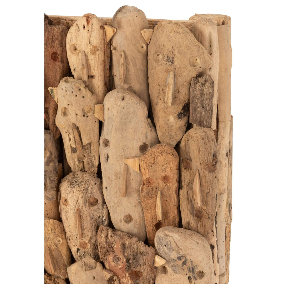 Close-up of Ralla Wall Deco showing hand-carved teak wood faces and natural texture.