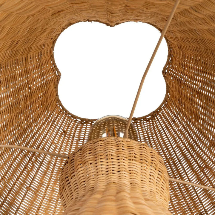 Close-up view inside the shade showing the woven rattan structure and light fitting detail.