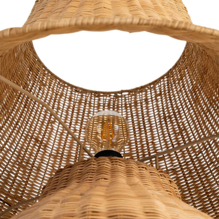 Close-up view inside the shade showing the woven rattan structure and bulb fitting.