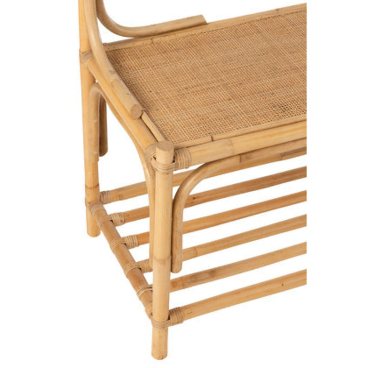 Close-up of woven rattan seat and bamboo frame corner