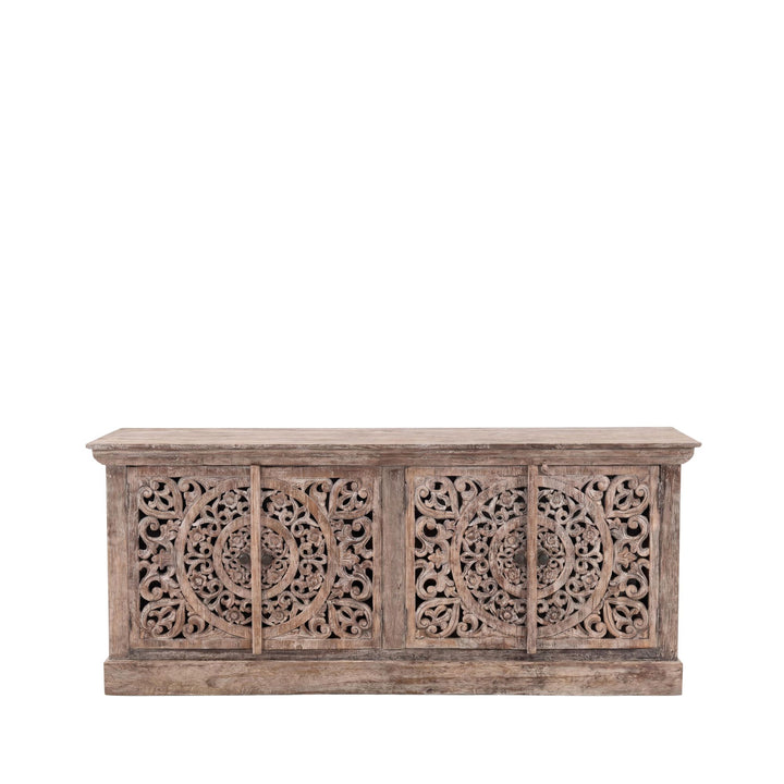 Front view of the Rawa buffet showing its hand-carved recycled teak wood doors and aged natural finish.