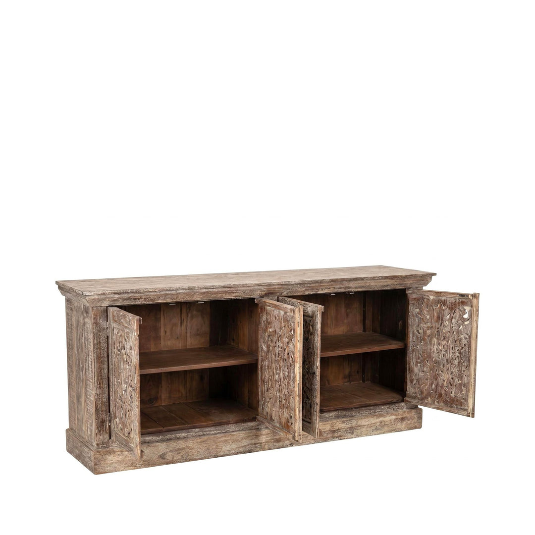 Open cabinet view showing the interior shelving and storage space behind the carved doors.