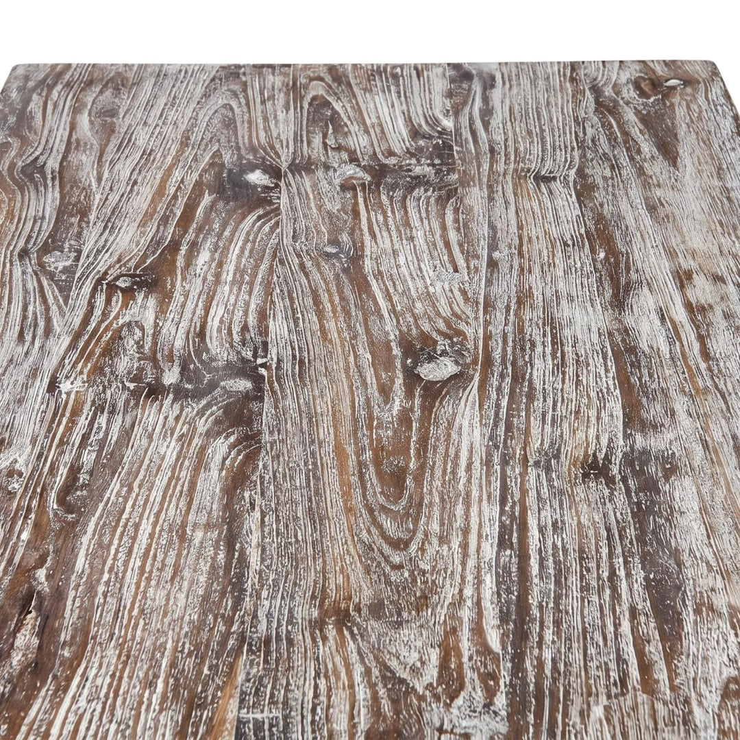 Close-up of the recycled teak wood surface showing the natural grain and aged tone variation.