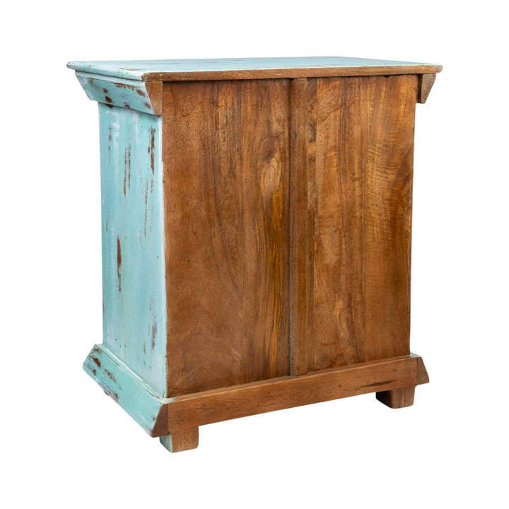 Rear view detail of the reclaimed wood texture and decorative metal accent on the Rinagar bedside table.