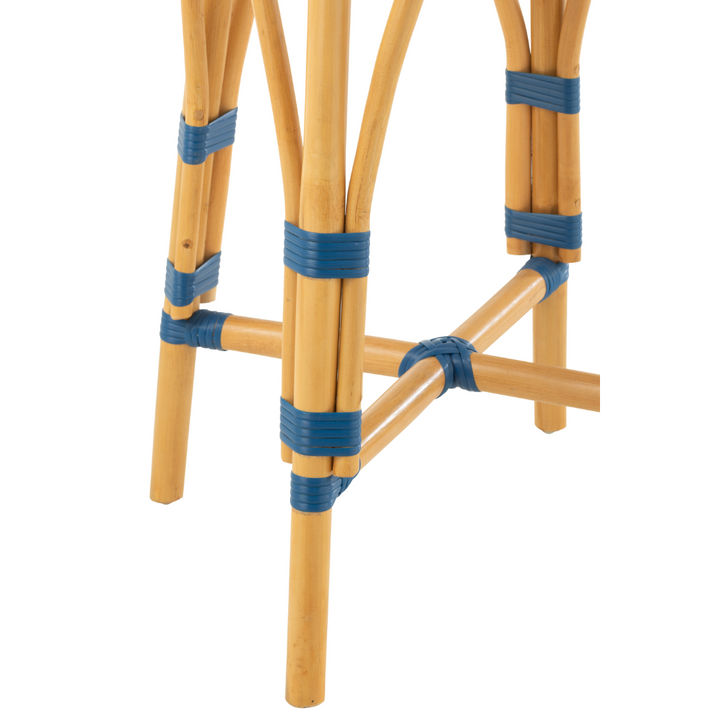 Detail view of Riviera Bistro Kitchen Stool legs and bindings showing rattan structure and craftsmanship.