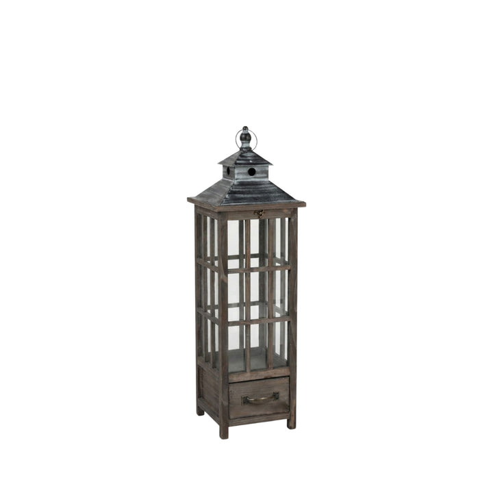 Single Roman lantern isolated on white background highlighting its vertical form and handcrafted wood base.