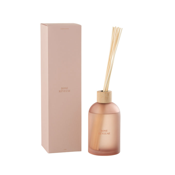 Rose Rêveuse Diffuser in frosted rose glass with reeds and packaging.