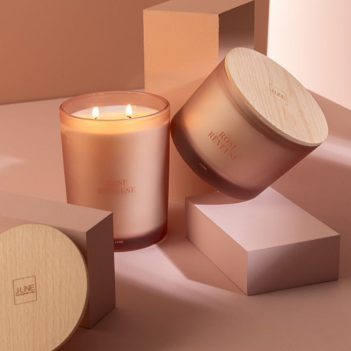 Side-by-side view of the candle and box with warm lighting.