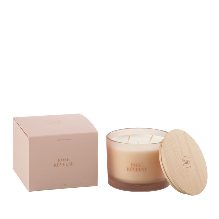 Rose Rêveuse candle shown with wooden lid and frosted rose glass.