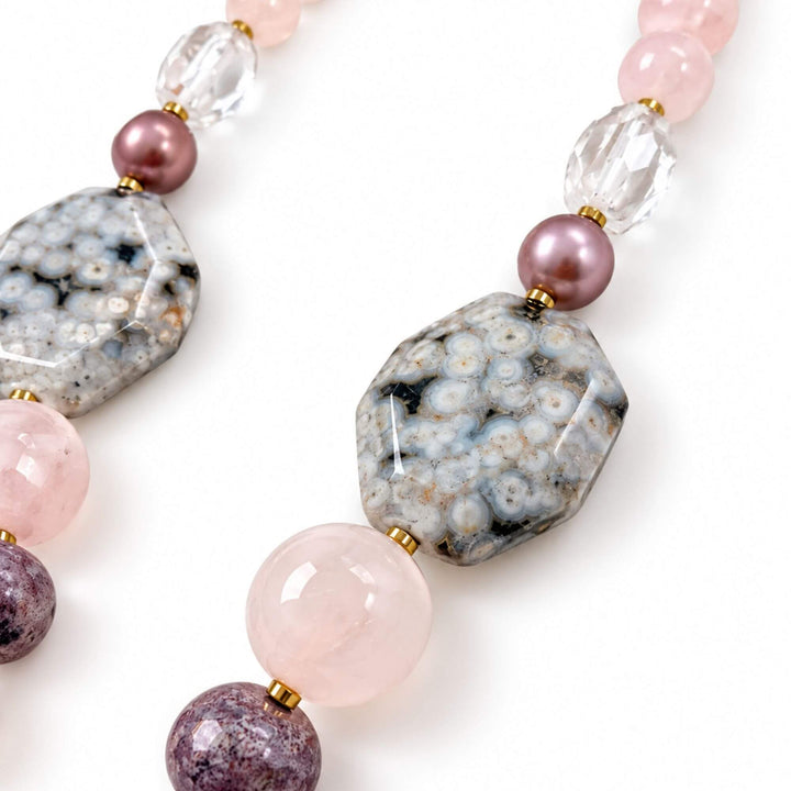 Close-up of ocean jasper, rose quartz and rock crystal on the Rose Ocean Stone Necklace