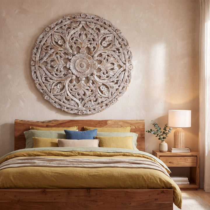 Round Mandala reclaimed wood wall deco displayed above a bed in a warm Mediterranean-inspired bedroom