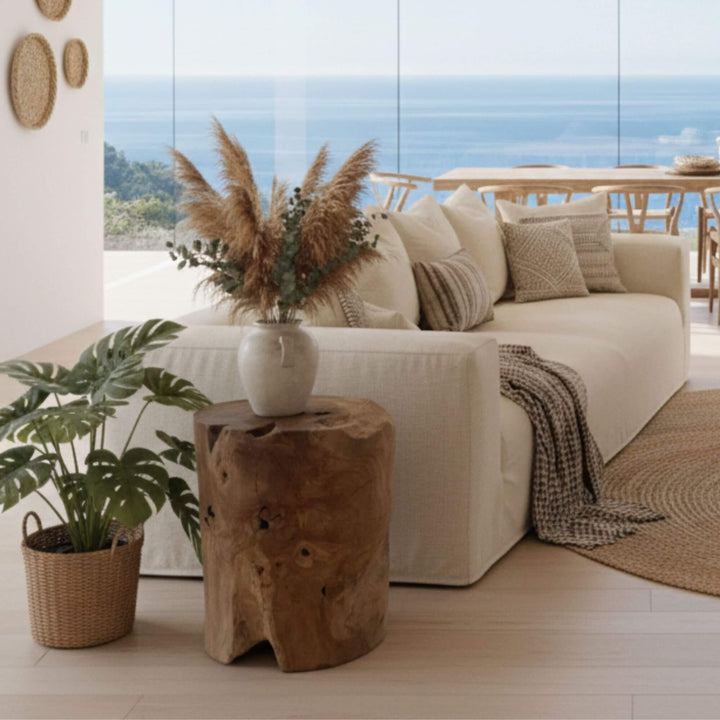Styled interior featuring the Rurutu Teak Root Stools in natural teak root.