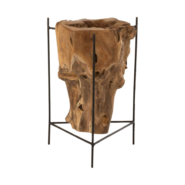 Front view of Rututu stand with natural teak root in black metal frame