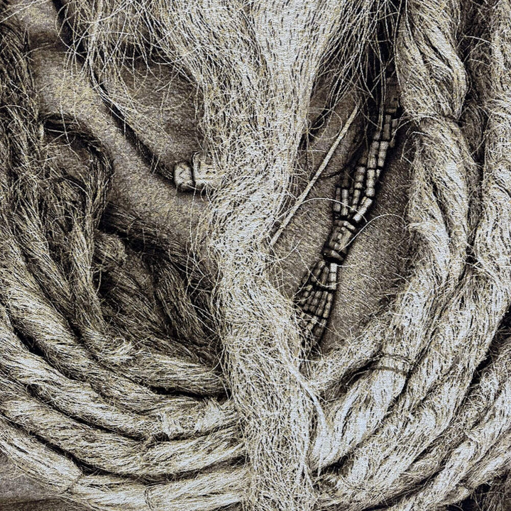 Close-up detail of the Sadhu Man tapestry highlighting the textured beard and facial expression.