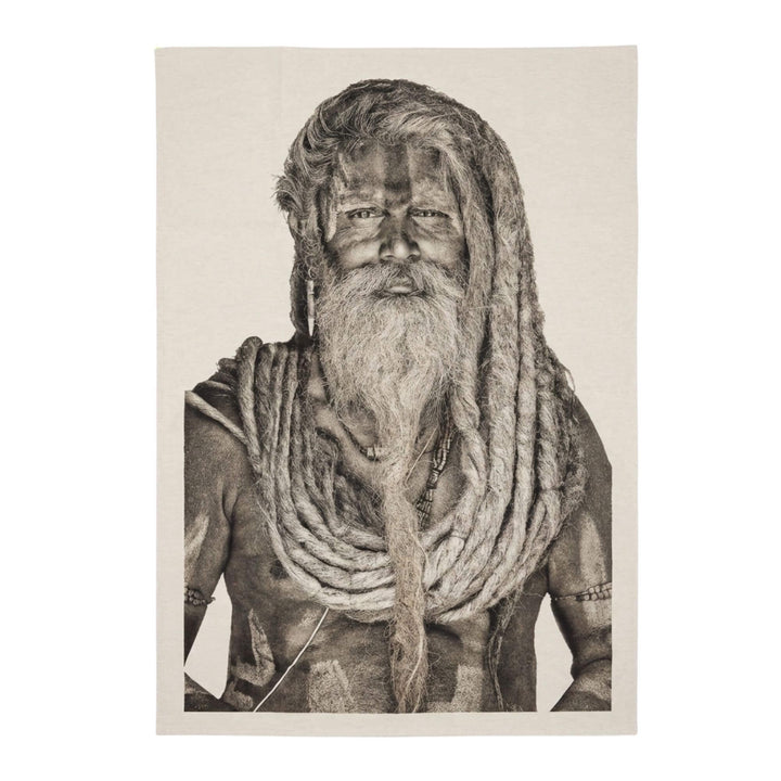 Front view of the Sadhu Man tapestry featuring a spiritual portrait in monochrome sepia tones.