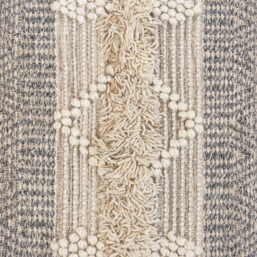 Close-up detail of the woven jute and cotton upholstery texture.
