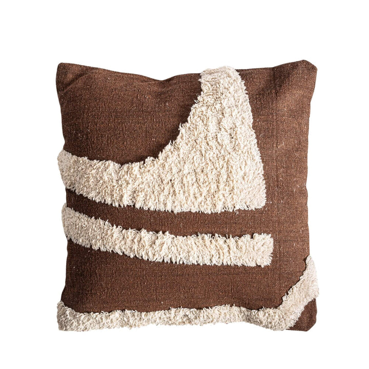 Front view of the Sahun cushion showing its warm brown fabric and textured cream tufted pattern.