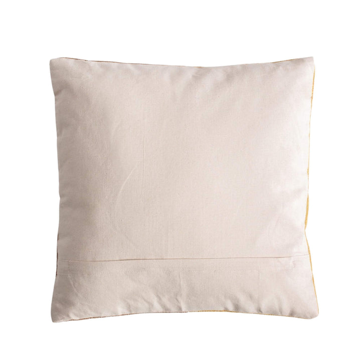 Back view of the cushion showing its plain neutral reverse side.