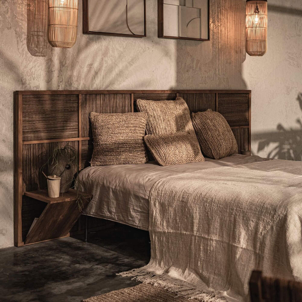 Centered view of the Samar Bedframe highlighting its sculptural natural design.