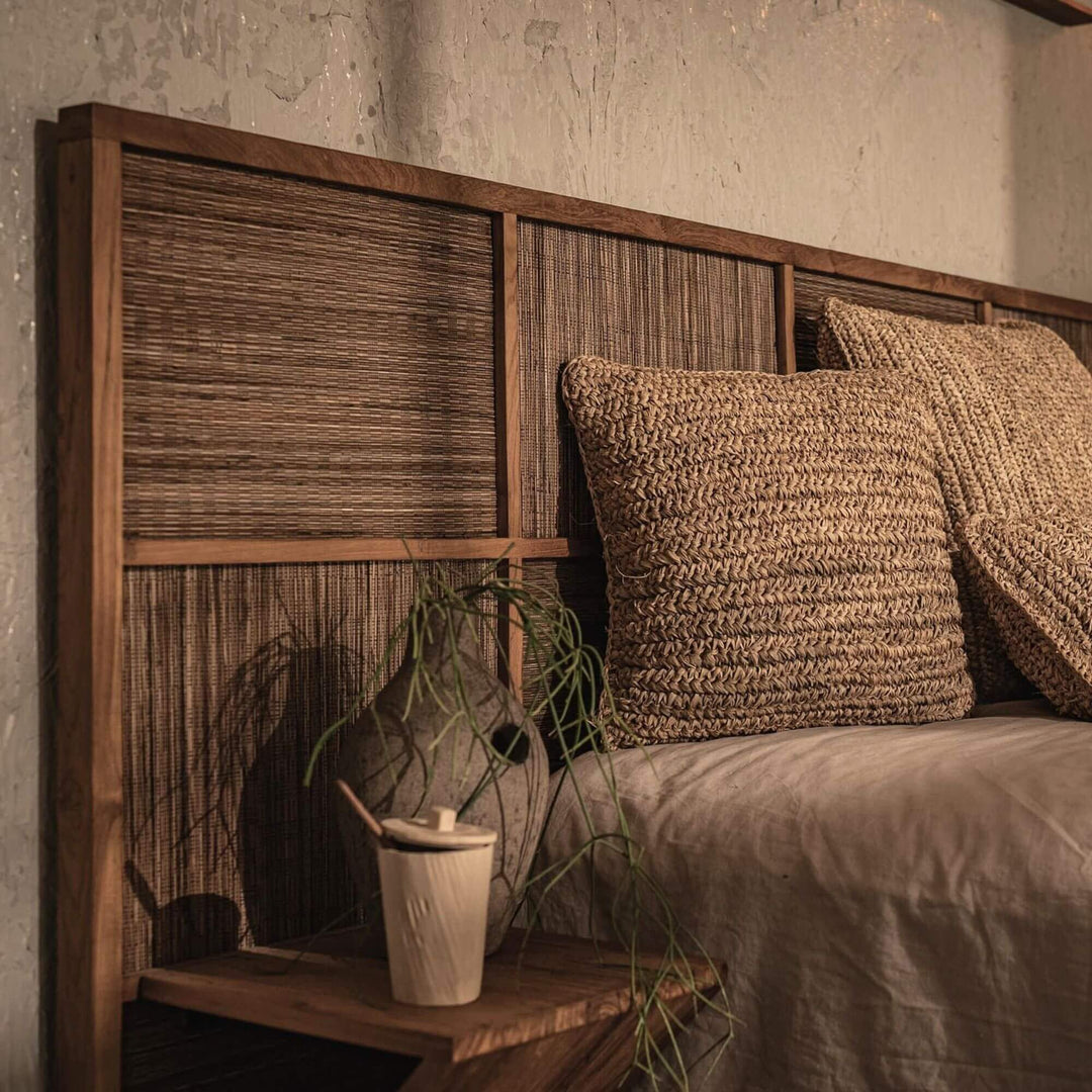 Close-up of the woven coconut headboard texture on the Samar Bed.