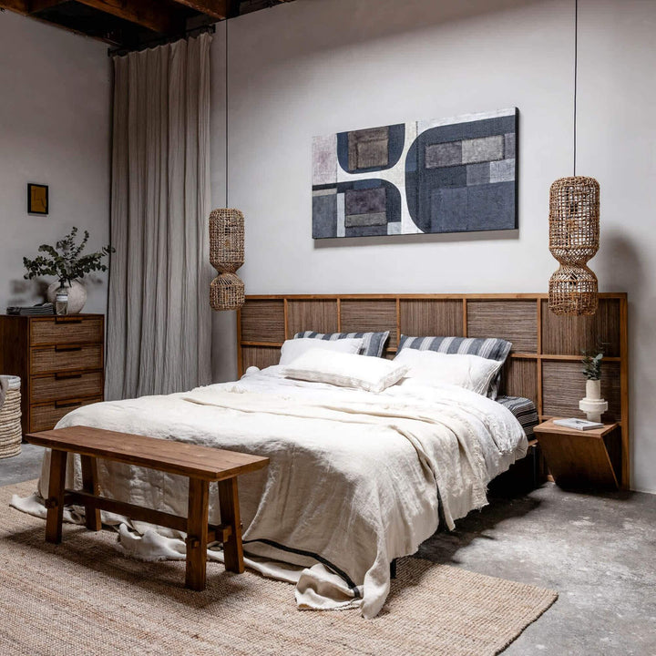 Side view of the Samar Bed showing teak wood details and built-in ledges.