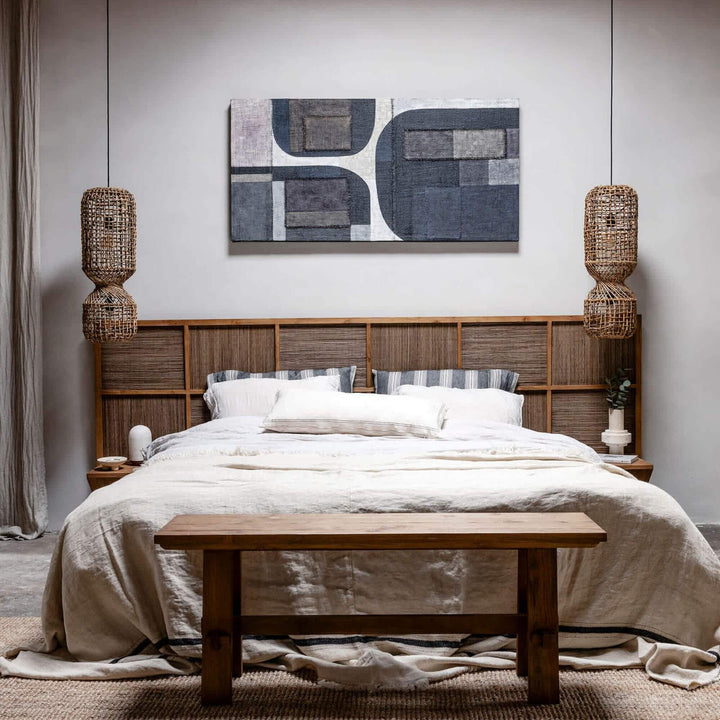 Styled bedroom featuring the Samar Bed in a warm, natural interior setting.