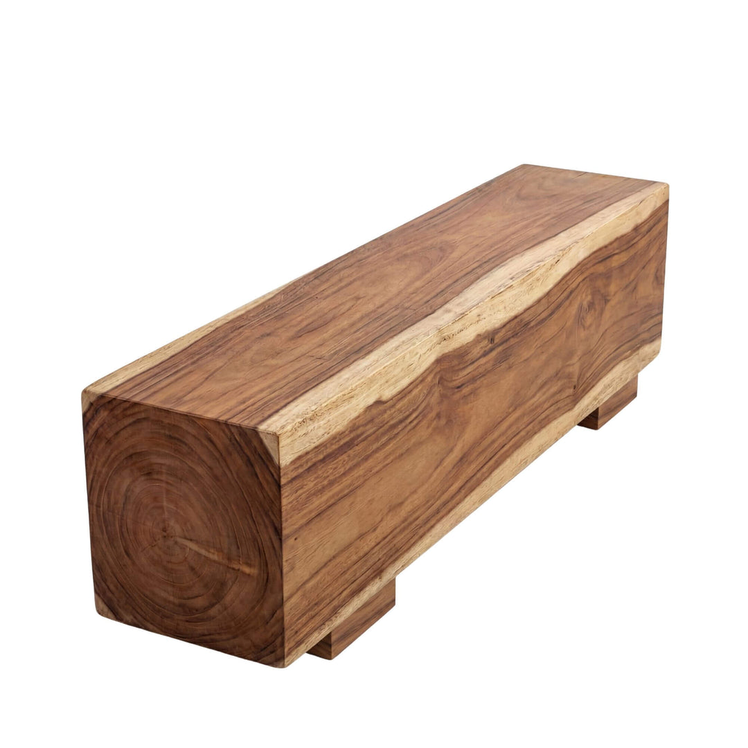 Front view of the Samosir suar wood bench showing its solid monolithic form and natural wood grain.