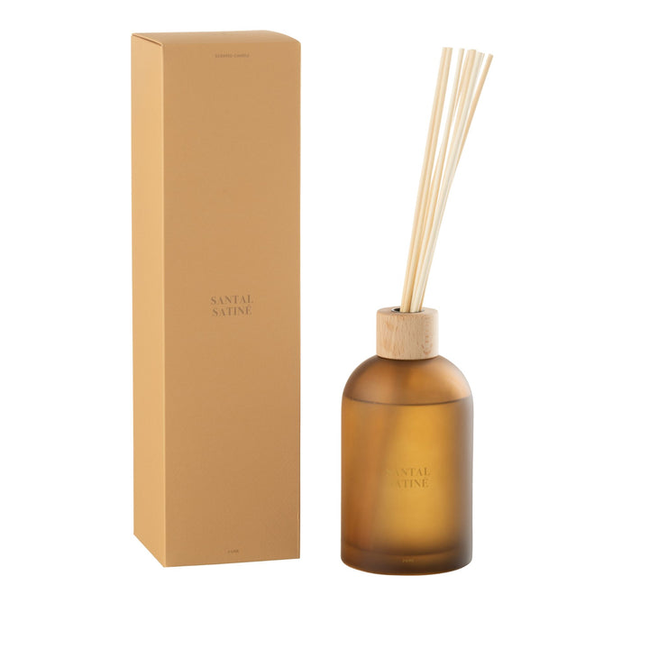 Front view of the Santal Satiné Diffuser with amber glass bottle and reeds.