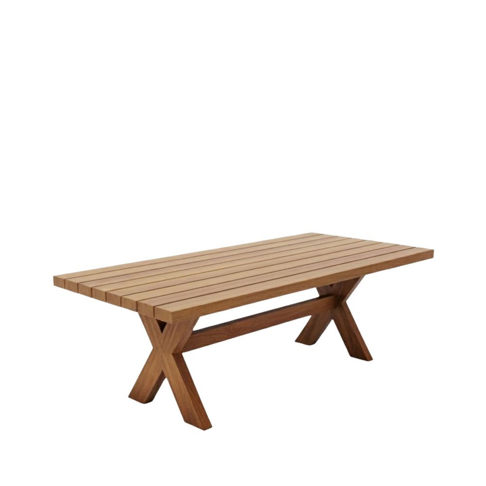 Front view of the Santorini outdoor dining table in teak with X-legs.