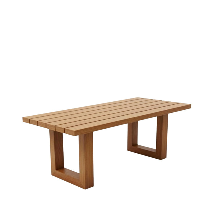 Front view of the Santorini outdoor dining table in teak with U-legs.