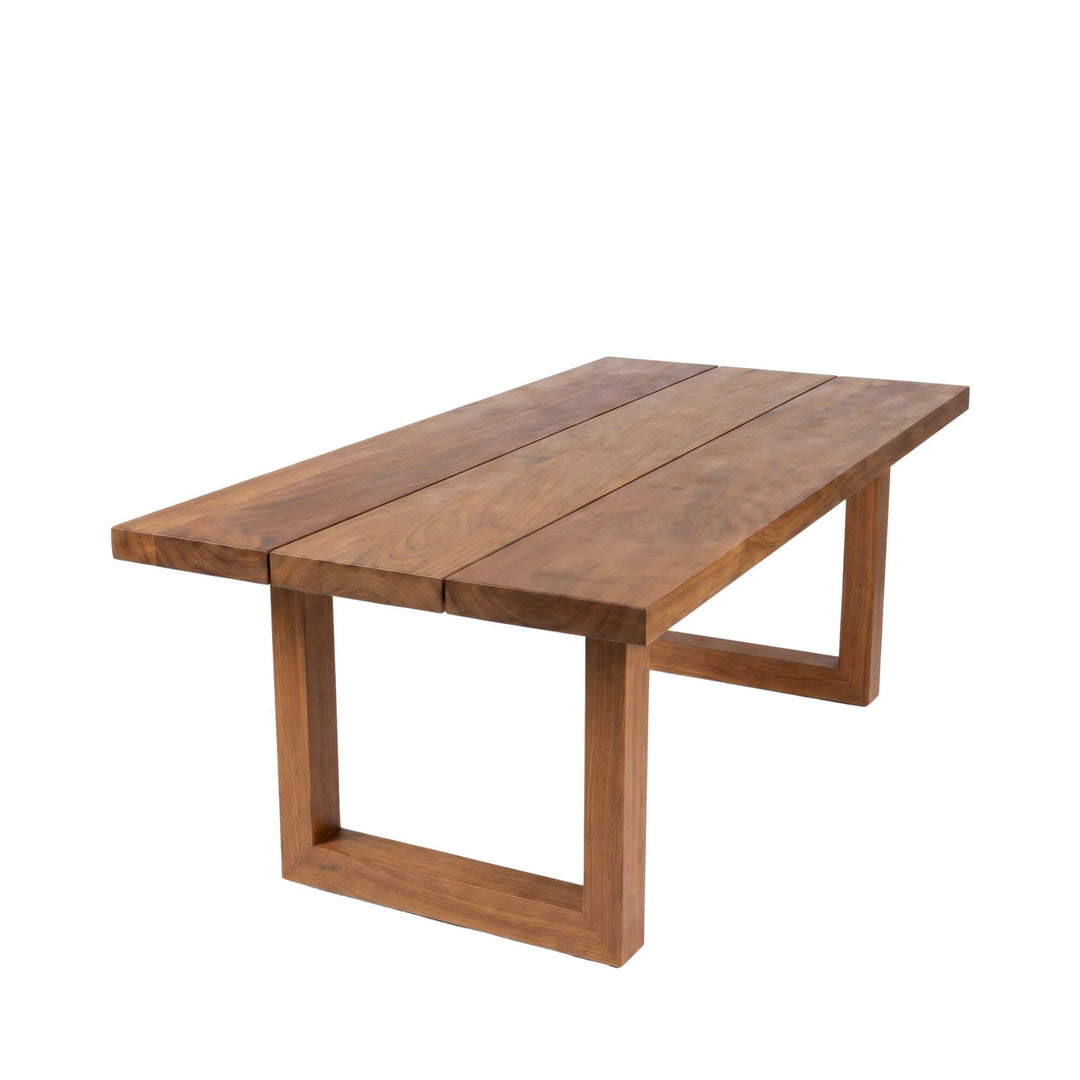 Angled view of Santorini outdoor dining table u legs in white background