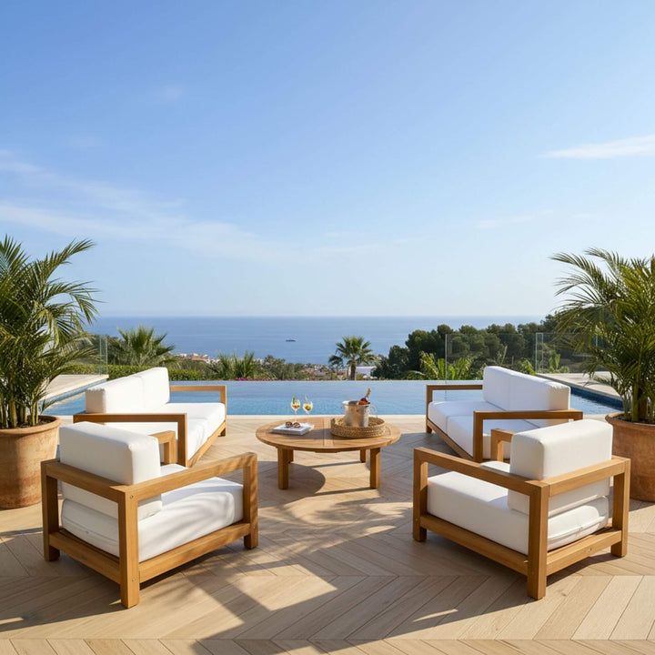 Santorini Solid Teak Sofa displayed on a terrace with ocean views.