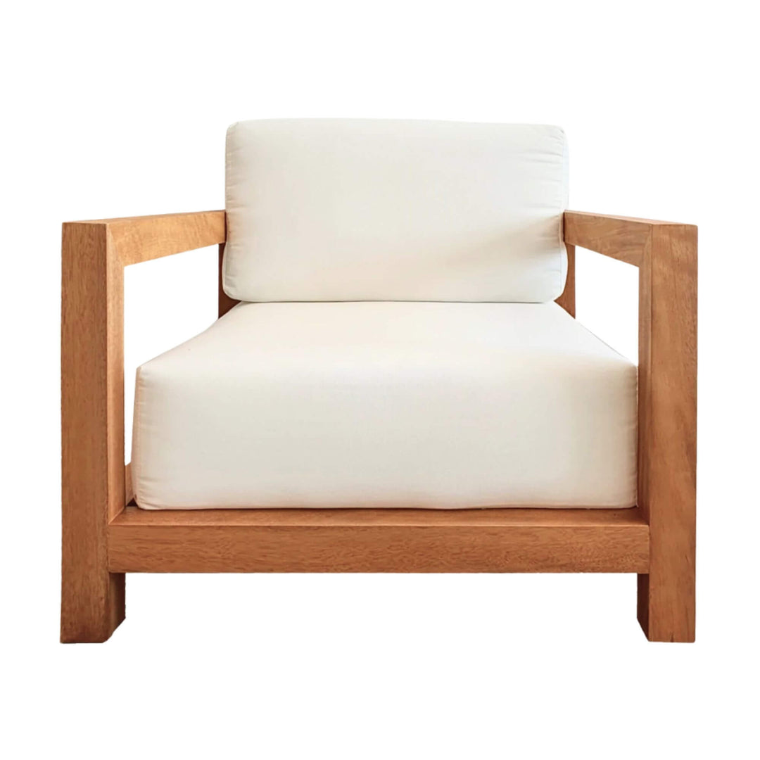Front view of the Santorini teak armchair with white outdoor cushions.