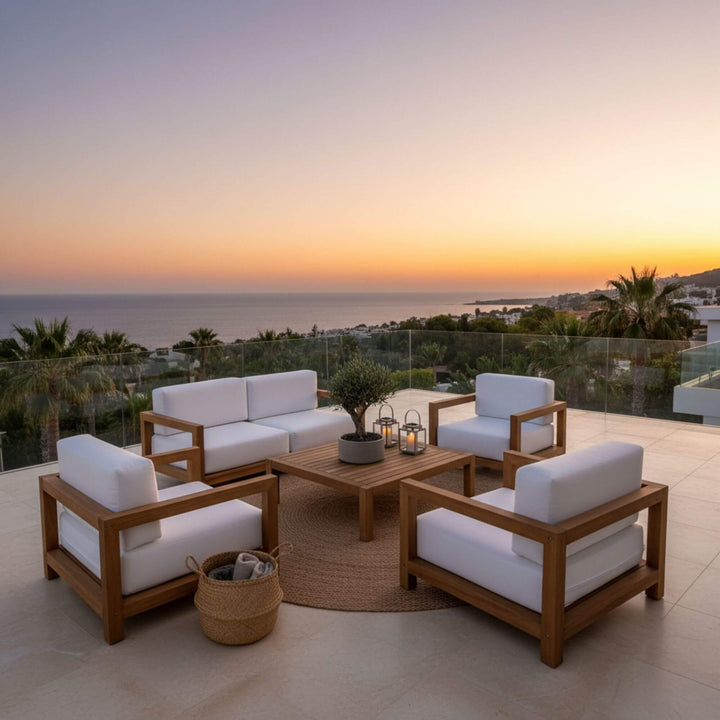 Santorini two seat outdoor sofa made of solid teak with white cushions.