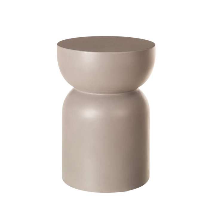 San Gimignano cement stool showcasing its sculptural silhouette and minimalist design.
