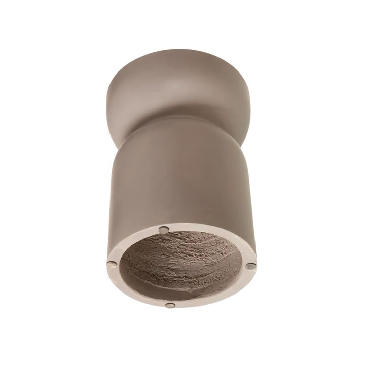 Side profile of the San Gimignano stool emphasizing its solid cement construction.