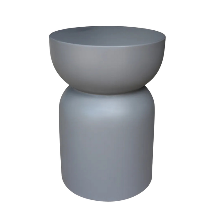 San Gimignano cement stool showcasing its sculptural silhouette and minimalist design.