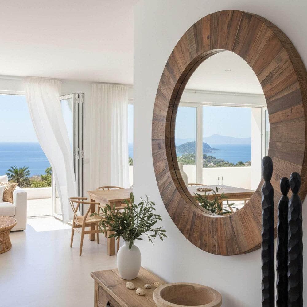 Front view of the Saona Round Mirror crafted from natural reclaimed wood and glass.